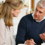 Two people talk about estate planning